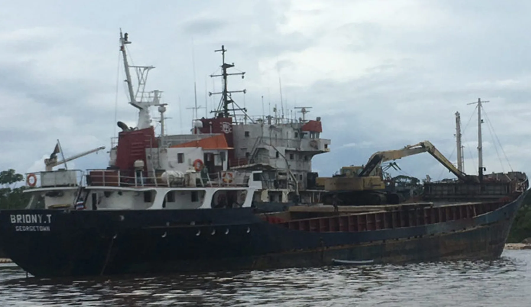 The Georgetown-registered cargo vessel Briony T loading on the river